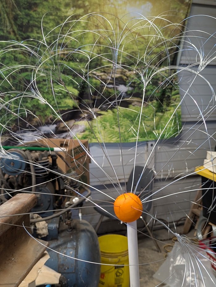 Metal dandelion 'puff' in progress