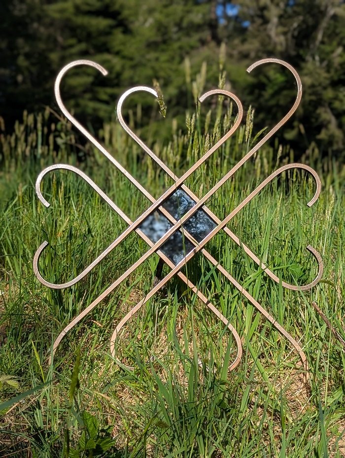 Metal scroll work mirror frame with heart shapes